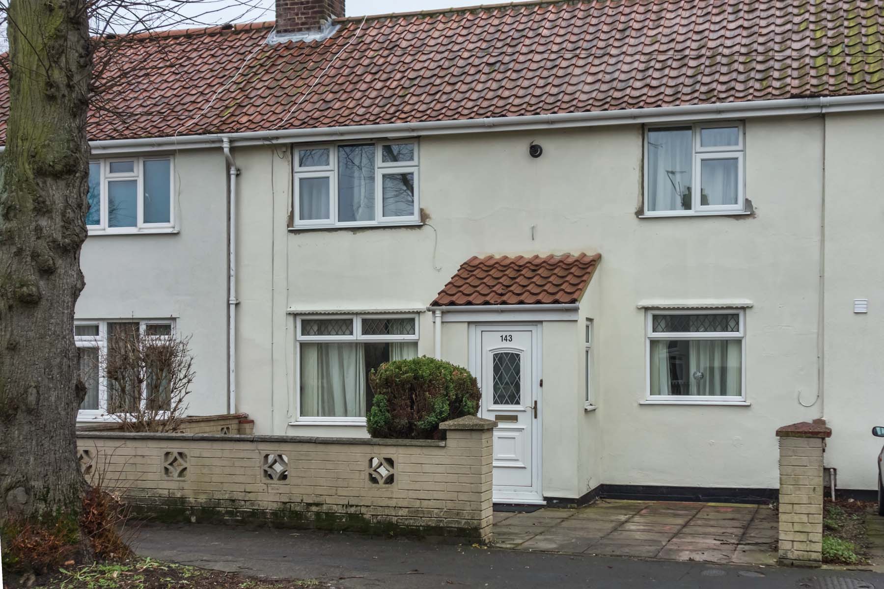 White painted house with front porch