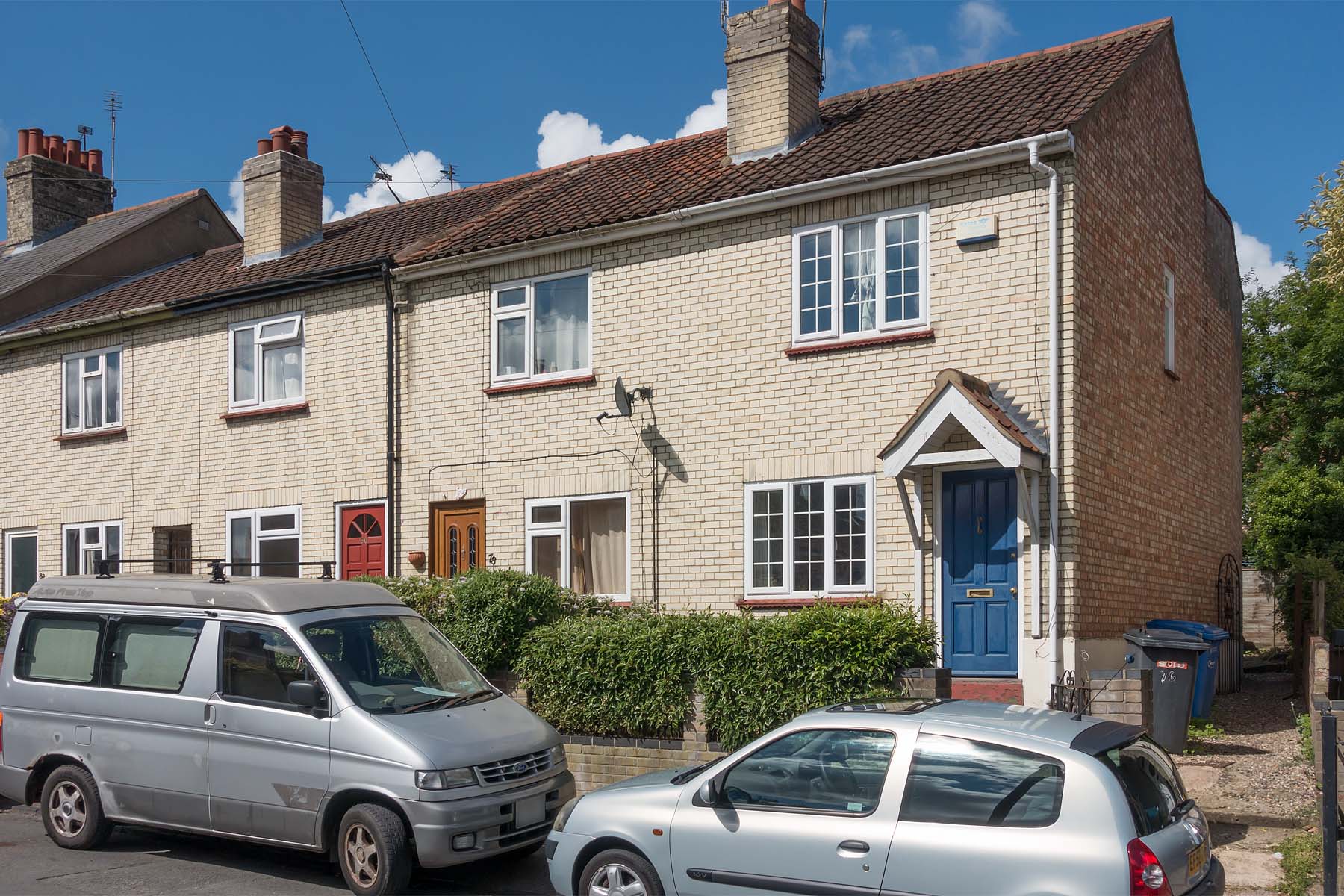 Terraced house with blue front door