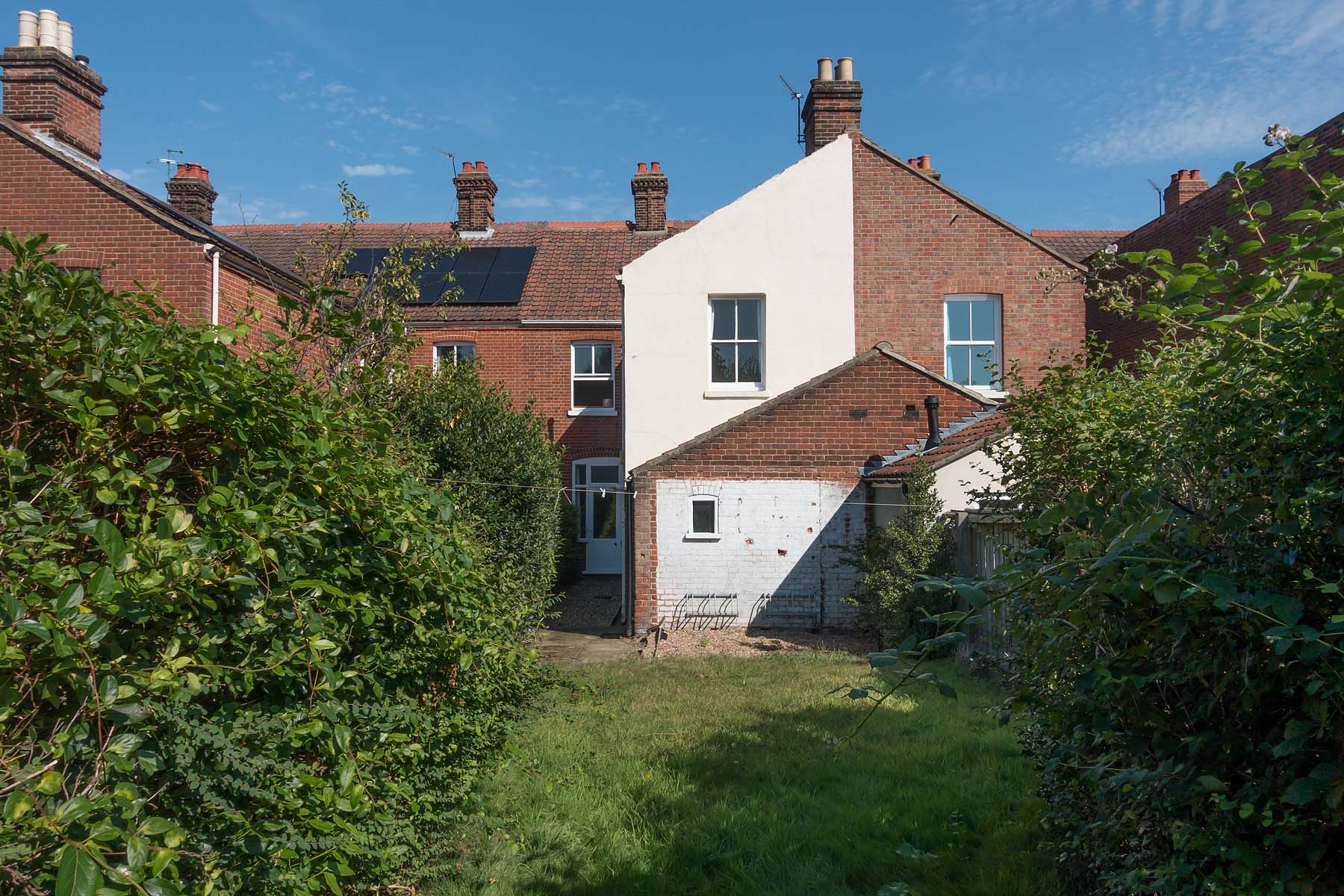 Rear view of property, garden set to lawn