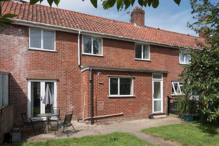 Red brick terraced house, view from rear