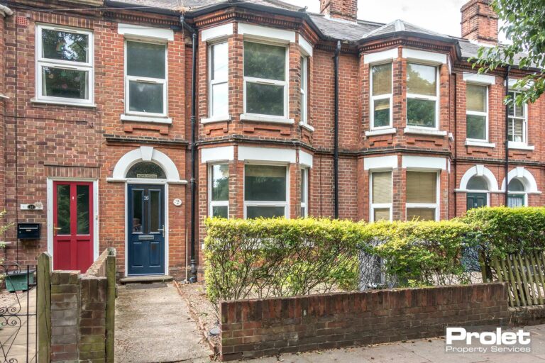 Large terraced house with front door entrance and bay windows