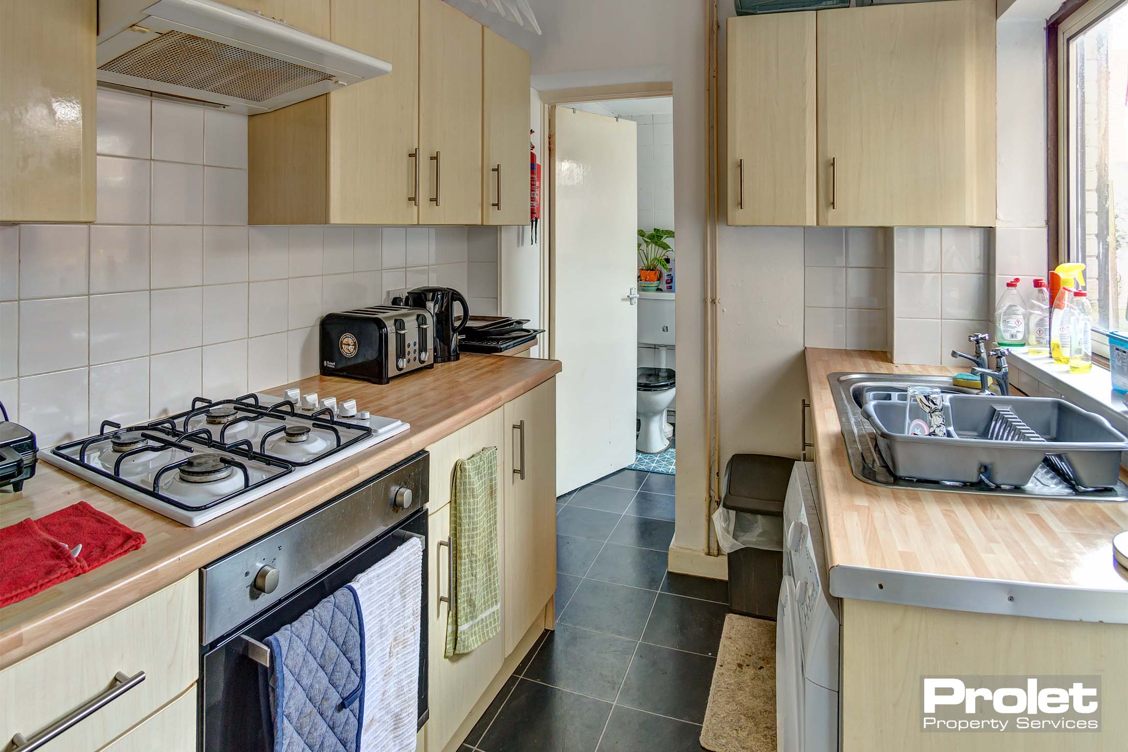 Wooden effect galley style kitchen