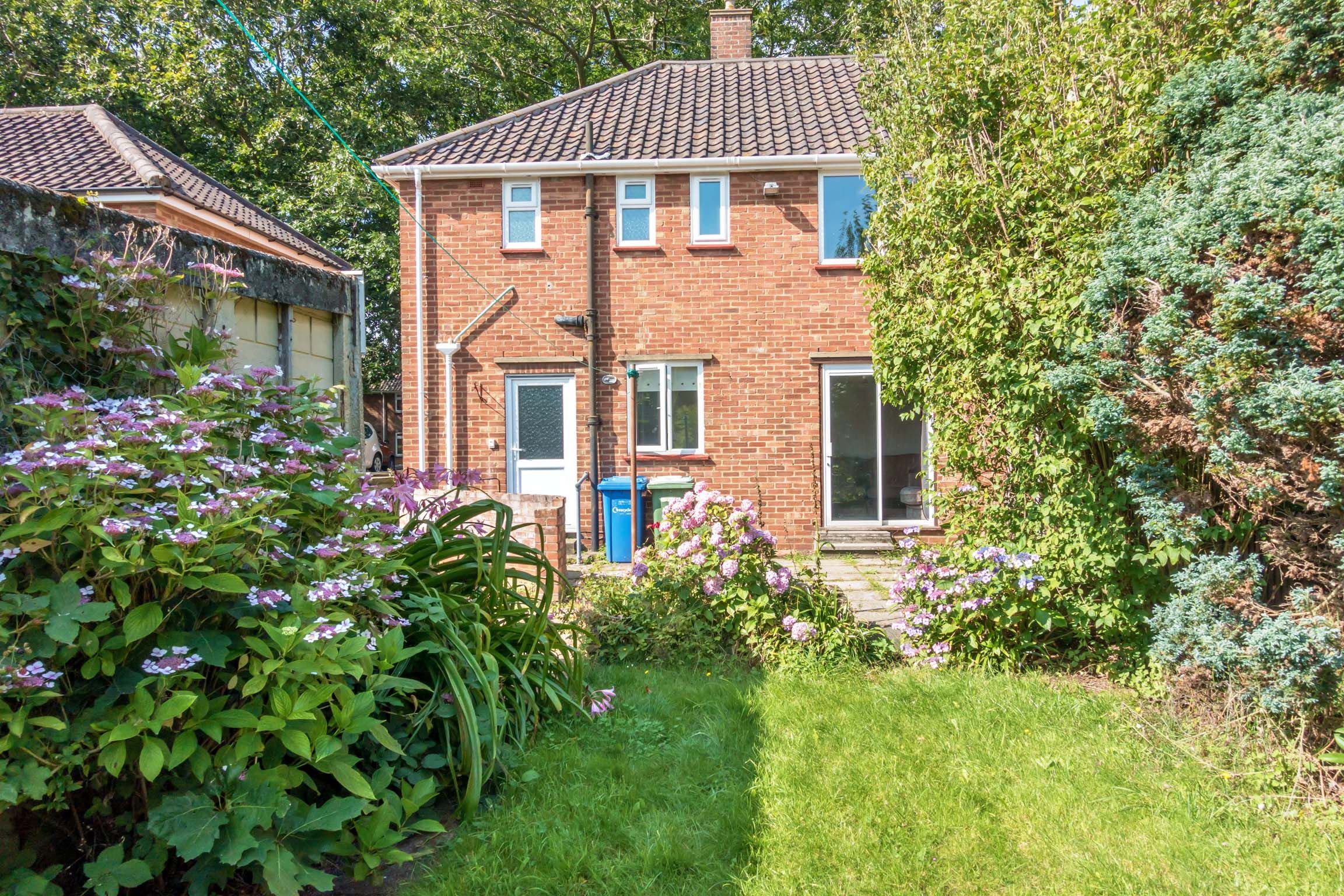 Rear view of the house with grass garden.