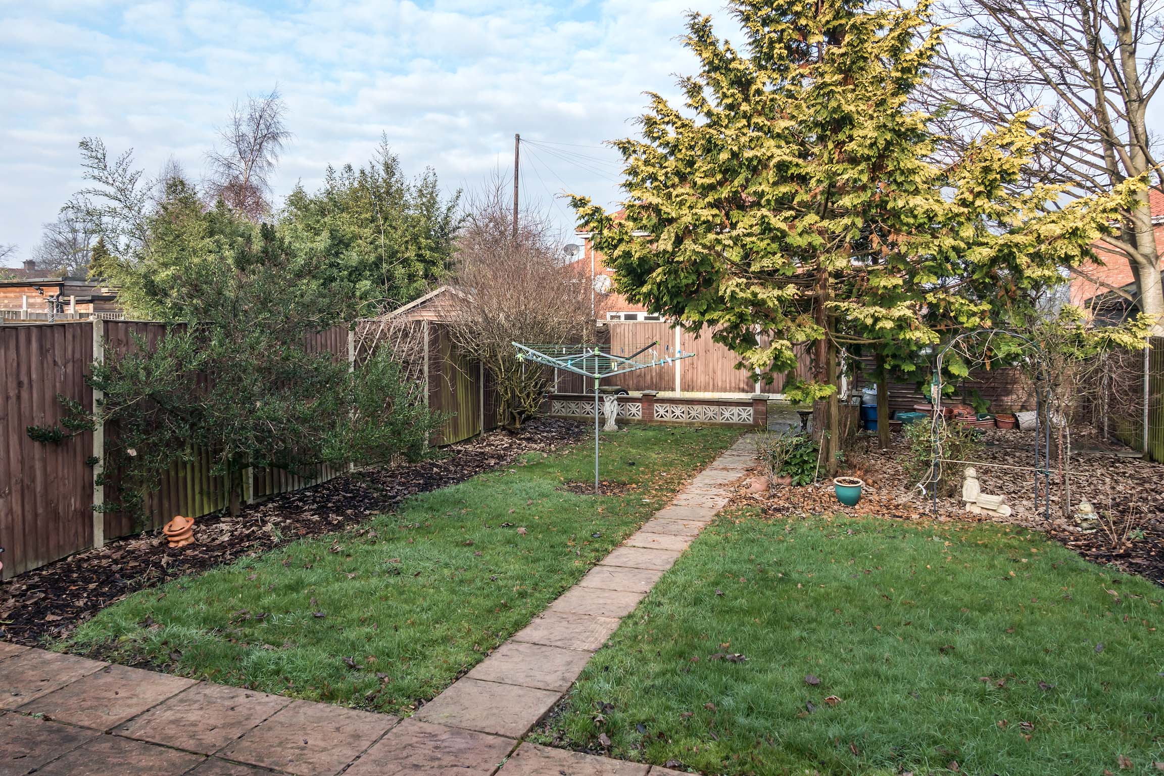 Back garden, lawn with garden path