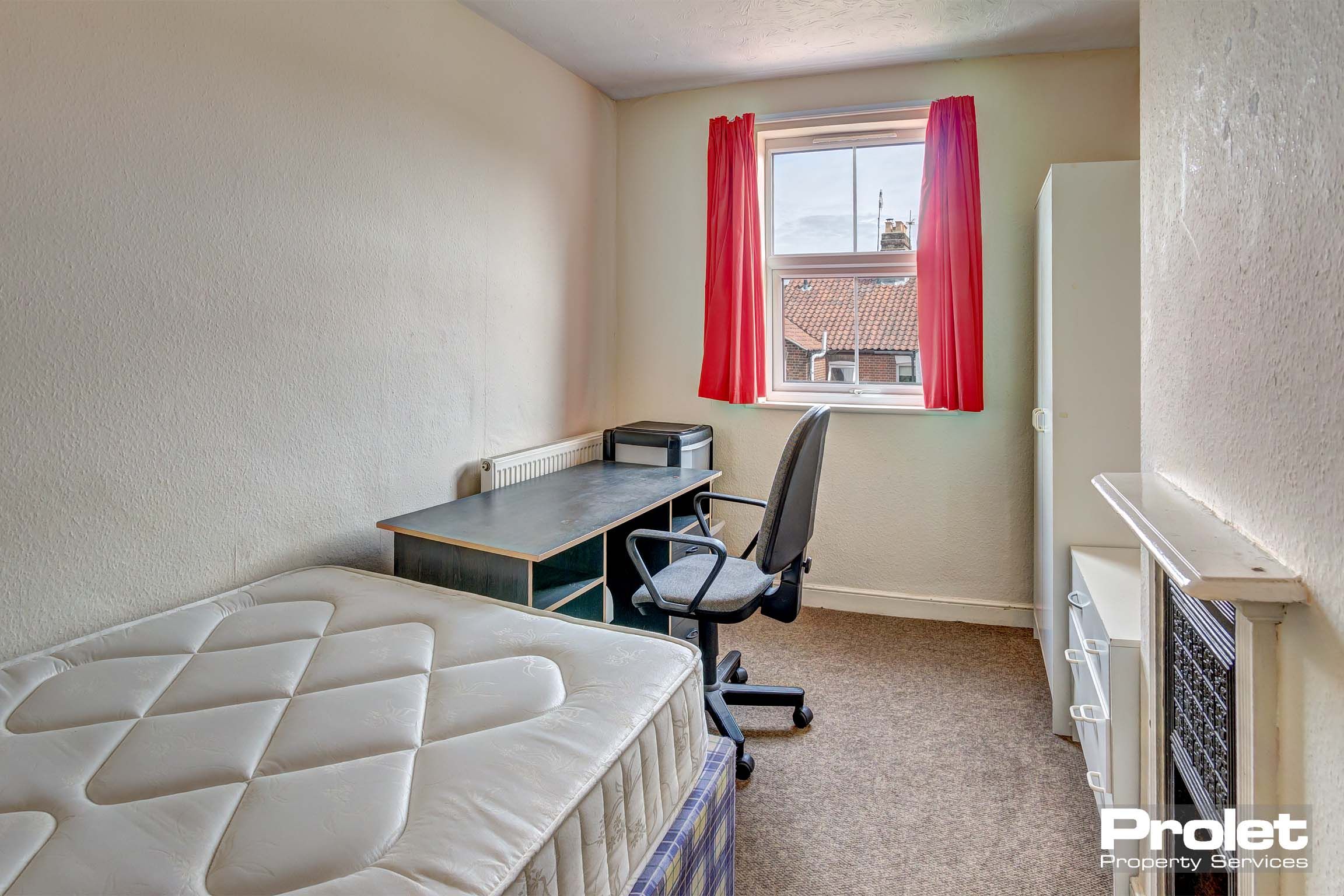 Bedroom with double bed and furnishings