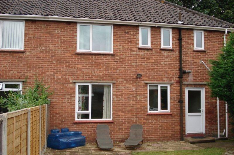 Red brick semi-detached house