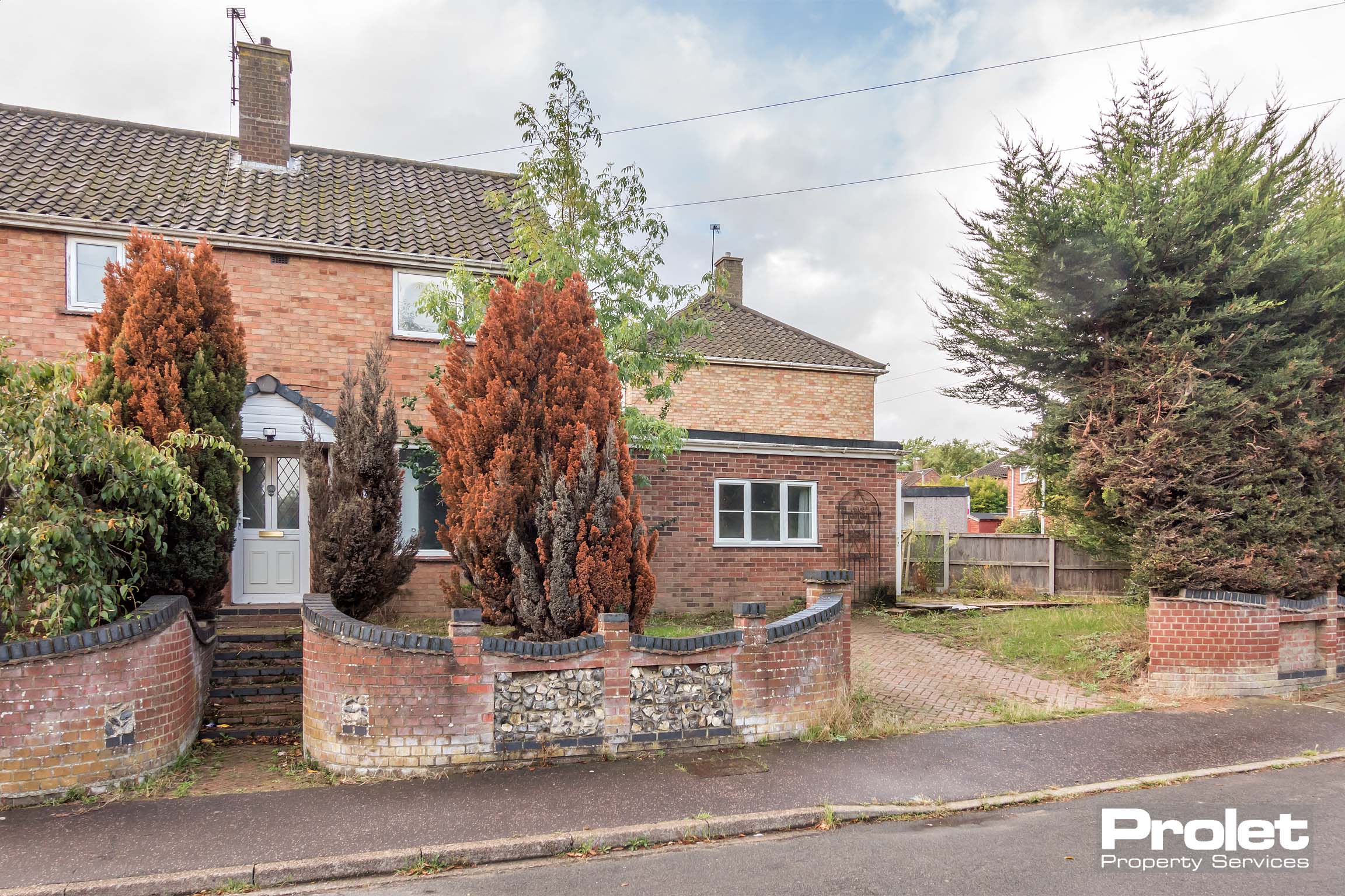 Semi detached house with side extension and driveway