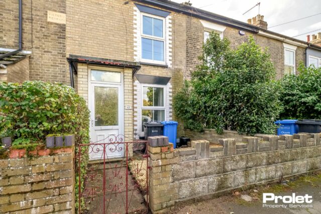 brick house on Trinity Street with small front garden