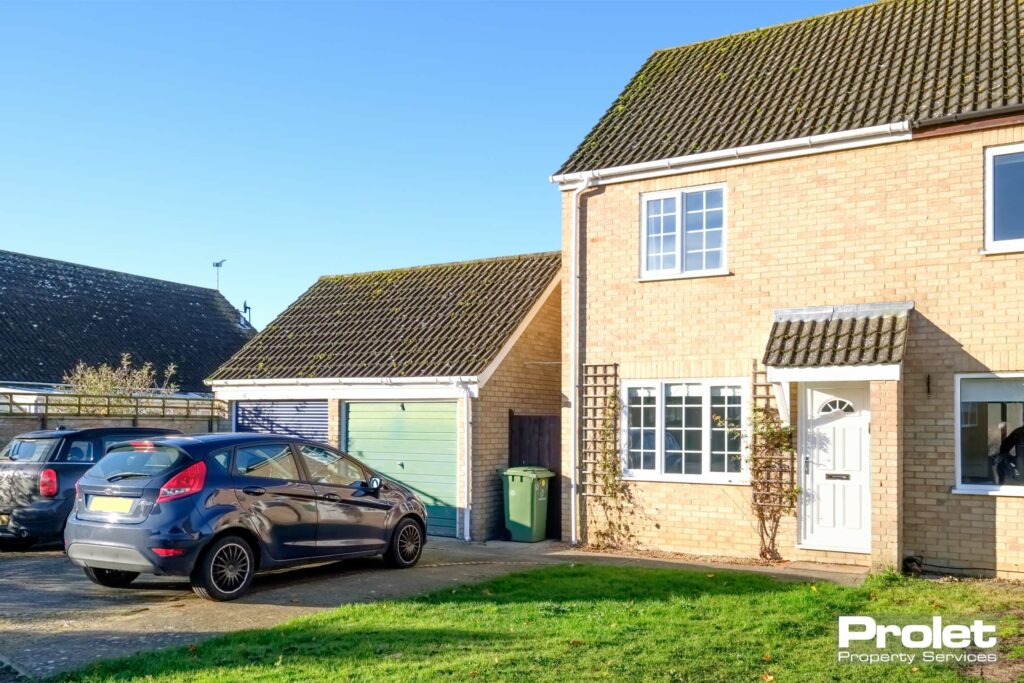 Brick house with garage and driveway