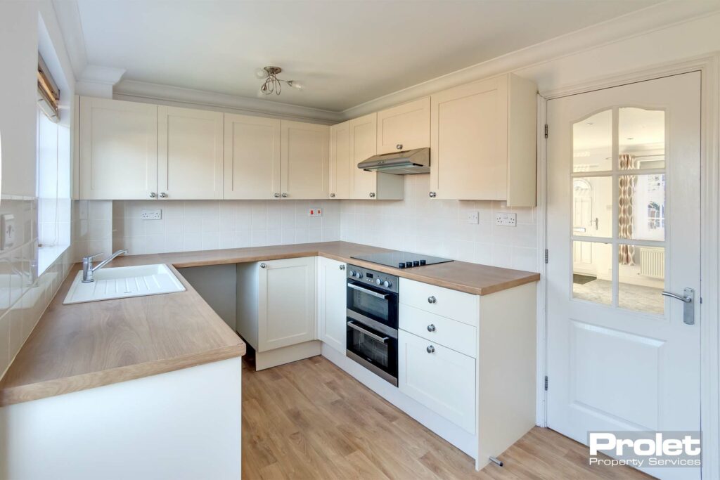 Modern kitchen with beech effect top