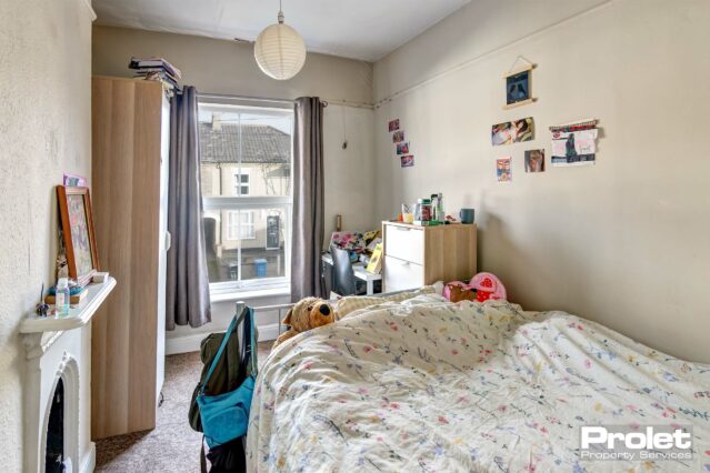 Double bedroom with wardrobe and chest of drawers