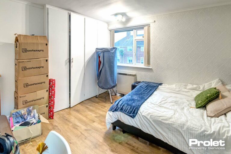 Upstairs double bedroom with built in wardrobes and desk