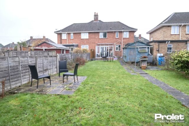 Large rear garden laid to lawn