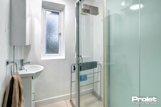 shower room with walk in shower